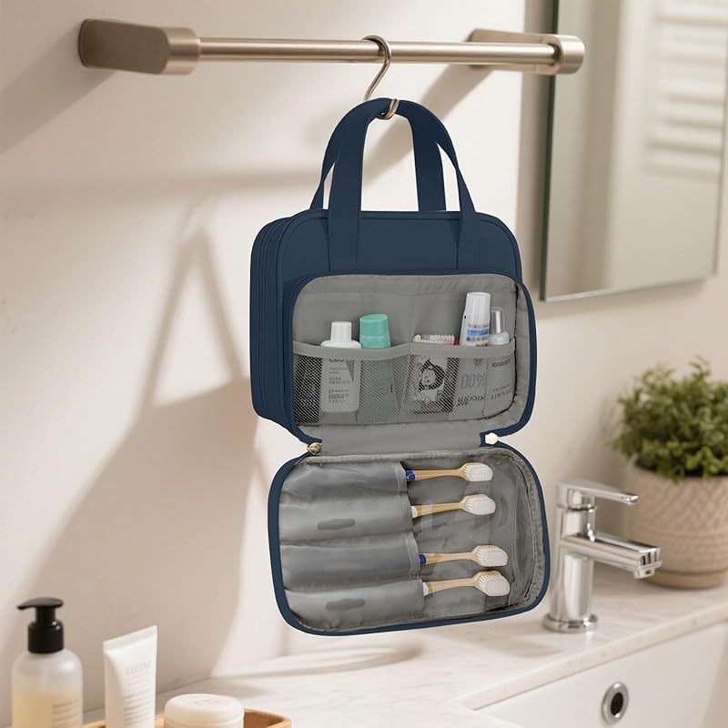 Travel Toiletry Bag . Water-resistant PU Leather Makeup Bag with Multiple Compartments . Large Capacity Makeup Organizer Bag with Handle for Accessories . Essentials . Toiletries . Navy Blue